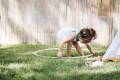 girl-taking-hula-hoop-from-ground